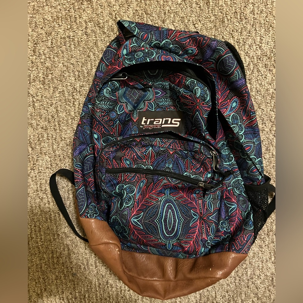 Backpack. Good condition. Used. Some peeling on bottom